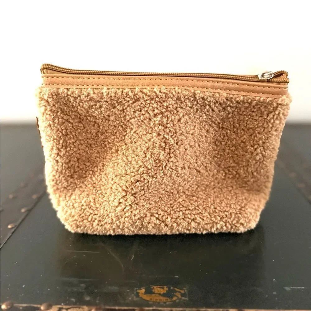 Neiman Marcus tan sherpa cosmetic bag